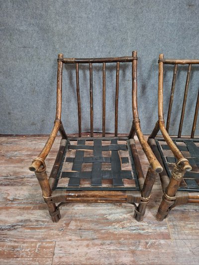 Paire de fauteuils bas en bambou, d’esprit exotique, datant du début du XXe