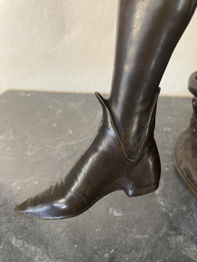 Bronze by Paul Fournier depicting a mandolin player or minstrel