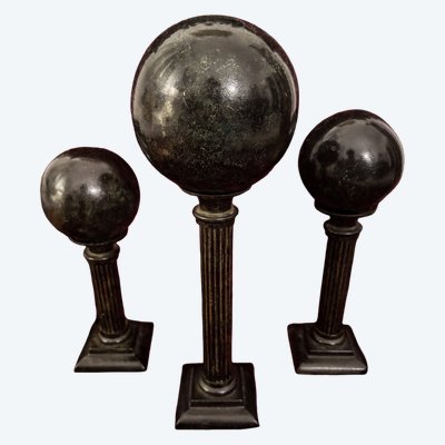 Neoclassical set of three bronze columns and spheres