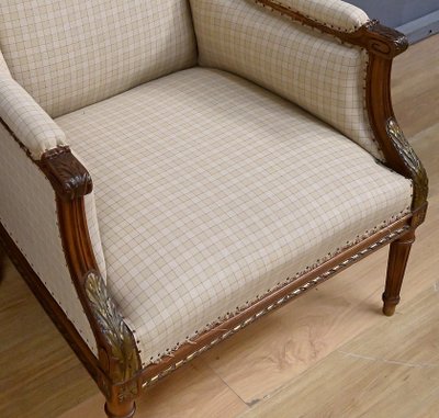 Wingback bergère armchair in walnut, Louis XVI style - Late 19th century