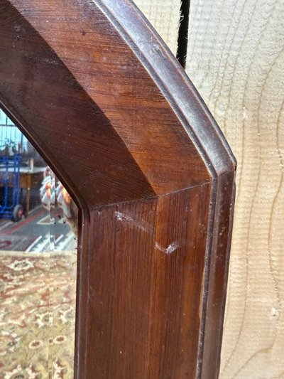 Miroir octogonal biseauté – Époque 1900 – Cadre bois teinté acajou