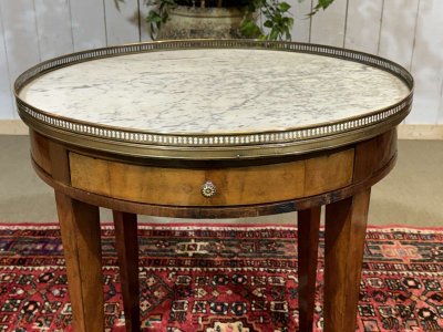 Louis XVI style bouillotte table in mahogany with a white marble top, dating from the 1930s