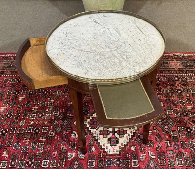 Louis XVI style bouillotte table in mahogany with a white marble top, dating from the 1930s