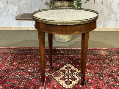 Louis XVI style bouillotte table in mahogany with a white marble top, dating from the 1930s