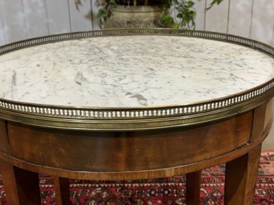 Louis XVI style bouillotte table in mahogany with a white marble top, dating from the 1930s