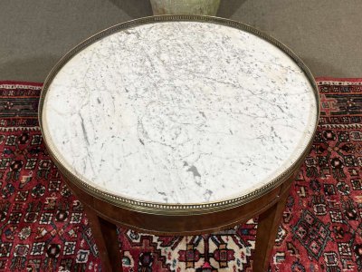 Louis XVI style bouillotte table in mahogany with a white marble top, dating from the 1930s
