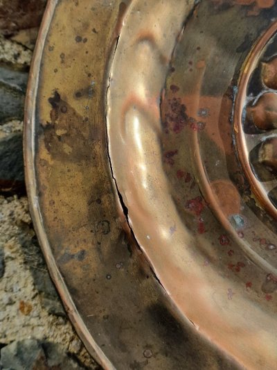 Copper repoussé collection plate, also known as a "quête" plate