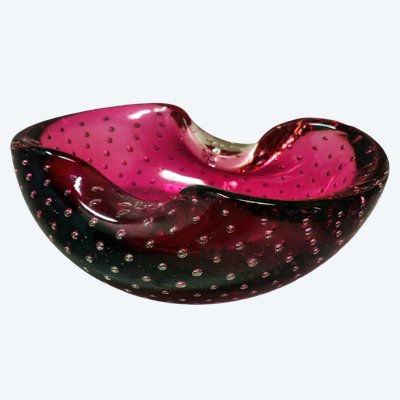 This mid-century modern ashtray or catchall, designed by the legendary Flavio Poli, was hand-blown i