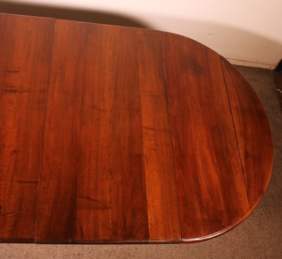Table de salle à manger extensible du début du 19° siècle en noyer