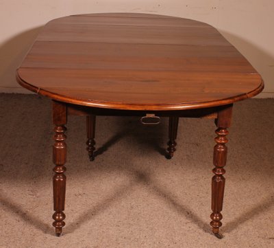 Table de salle à manger extensible du début du 19° siècle en noyer