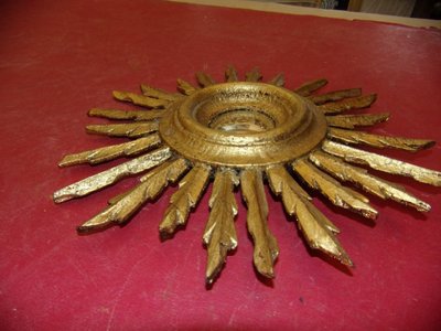 Witch Mirror, late 19th century, gilded wood.