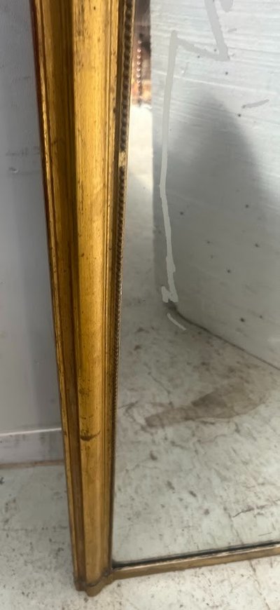 Specchio dorato in stile Rocaille in legno e stucco dorato XIX secolo