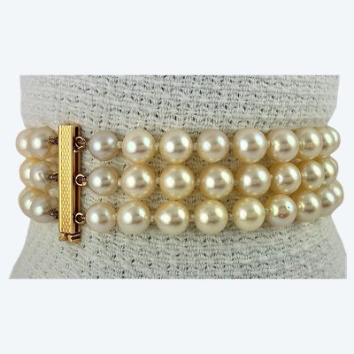 Three-strand bracelet with Japanese Akoya cultured pearls and a rose gold clasp.