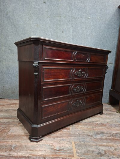 Cassettiera in mogano e legno chiaro di epoca napoleonica III.