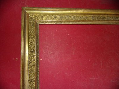 Cornice del XIX secolo in legno dorato.