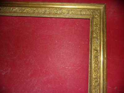 Cornice del XIX secolo in legno dorato.