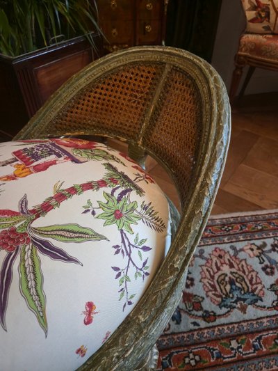 Louis XVI style caned chaise longue, late 19th century.