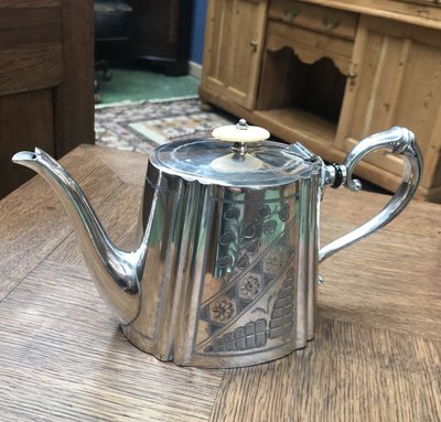 silver-plated metal teapot
