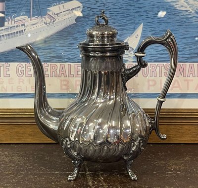 Louis XV style silver-plated metal teapot