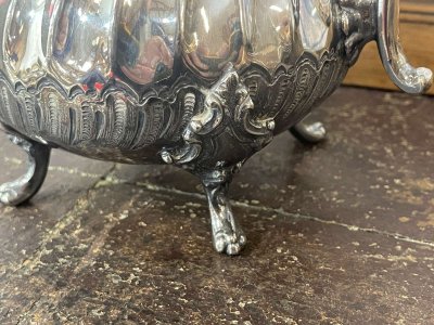 Louis XV style silver-plated metal teapot