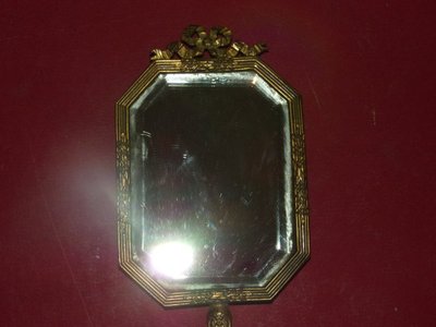 Specchio portatile in rame, XIX secolo.