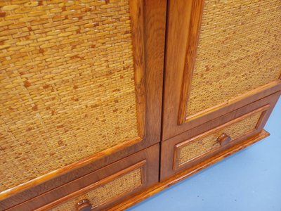 Vintage wardrobe in woven rattan and Maugrion wood for Roche-Bobois from the 70s