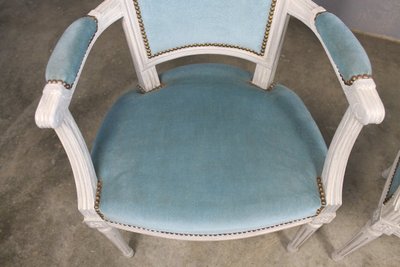 Paire de fauteuils en hêtre rechampi de style Louis XVI époque 20ème