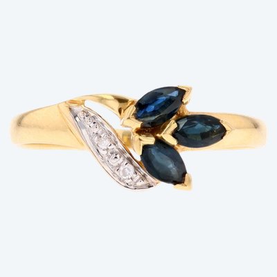 Anello con zaffiro e diamante in oro giallo