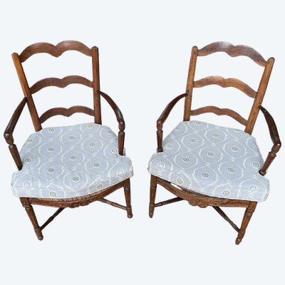 A pair of Provencal armchairs.
