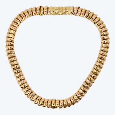 BOUCHERON Collana a catena e bracciale ondulato in oro giallo