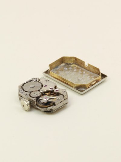 Montre Art Déco or blanc diamants