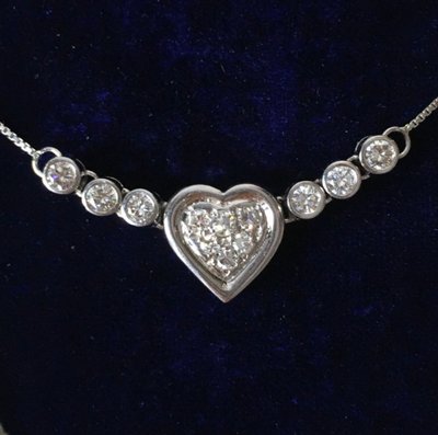 Collier coeur en or blanc 18K et diamants