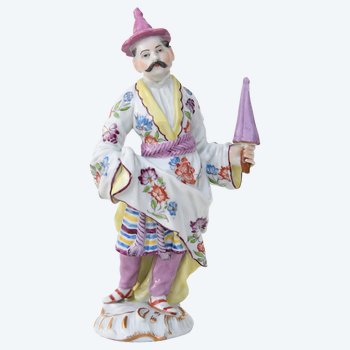 Porcelain statuette representing an Asian man