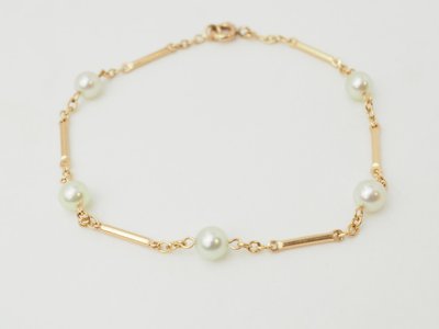 Bracciale vintage in oro giallo 18 carati e perle coltivate