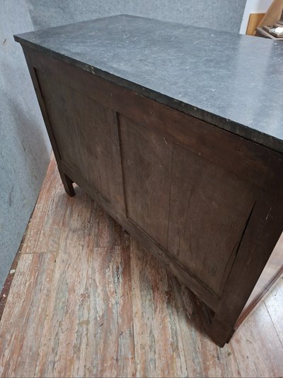 Cassettiera in stile Impero in mogano e impiallacciatura di mogano fiammato, XIX secolo.