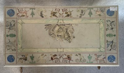 Wrought-iron coffee table with marble top