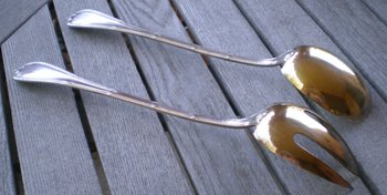 Magnificent salad plate in silver and vermeil model Rubans silversmith Christofle