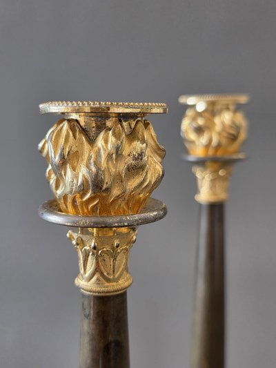  Pair of "flaming" candlesticks, Empire period.