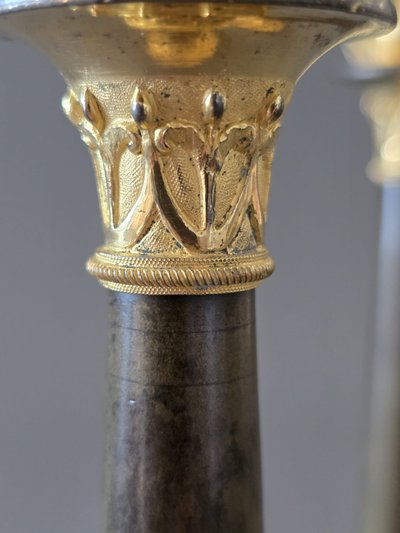  Pair of "flaming" candlesticks, Empire period.