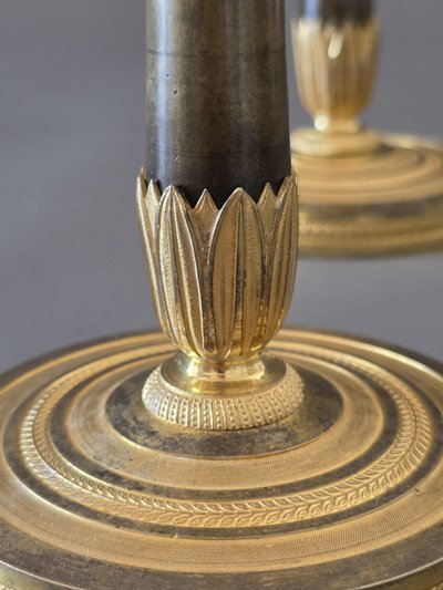  Pair of "flaming" candlesticks, Empire period.