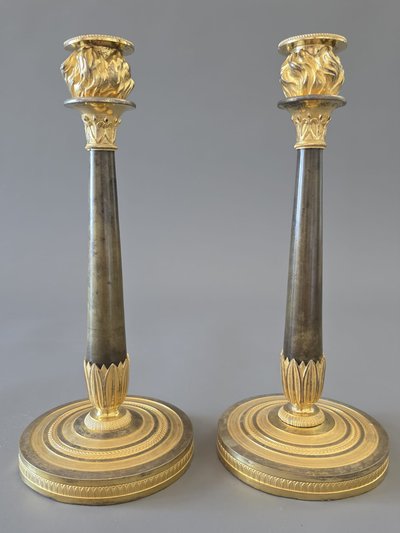  Pair of "flaming" candlesticks, Empire period.