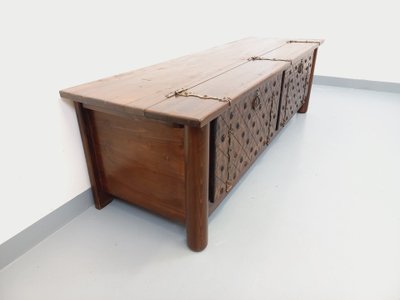 Low brutalist sideboard by Georges Robert, made of dark pine, from the 1950s–1960s