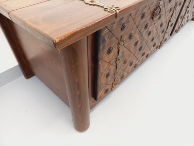 Low brutalist sideboard by Georges Robert, made of dark pine, from the 1950s–1960s