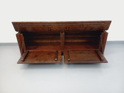 Low brutalist sideboard by Georges Robert, made of dark pine, from the 1950s–1960s