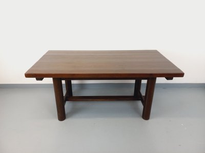 Rectangular Brutalist dining table by Georges Robert, made of dark pine, from the 1950s and 1960s