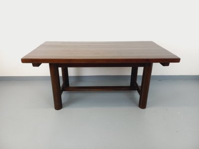 Rectangular Brutalist dining table by Georges Robert, made of dark pine, from the 1950s and 1960s