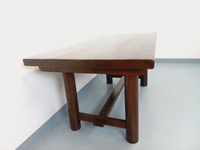 Rectangular Brutalist dining table by Georges Robert, made of dark pine, from the 1950s and 1960s