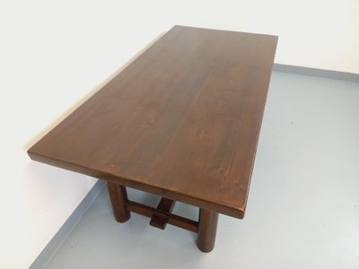 Rectangular Brutalist dining table by Georges Robert, made of dark pine, from the 1950s and 1960s