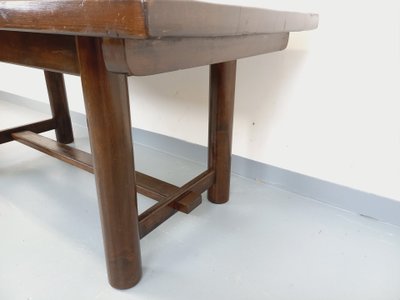 Rectangular Brutalist dining table by Georges Robert, made of dark pine, from the 1950s and 1960s