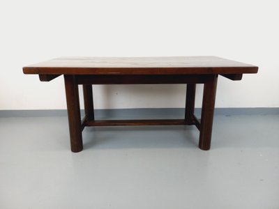 Rectangular Brutalist dining table by Georges Robert, made of dark pine, from the 1950s and 1960s